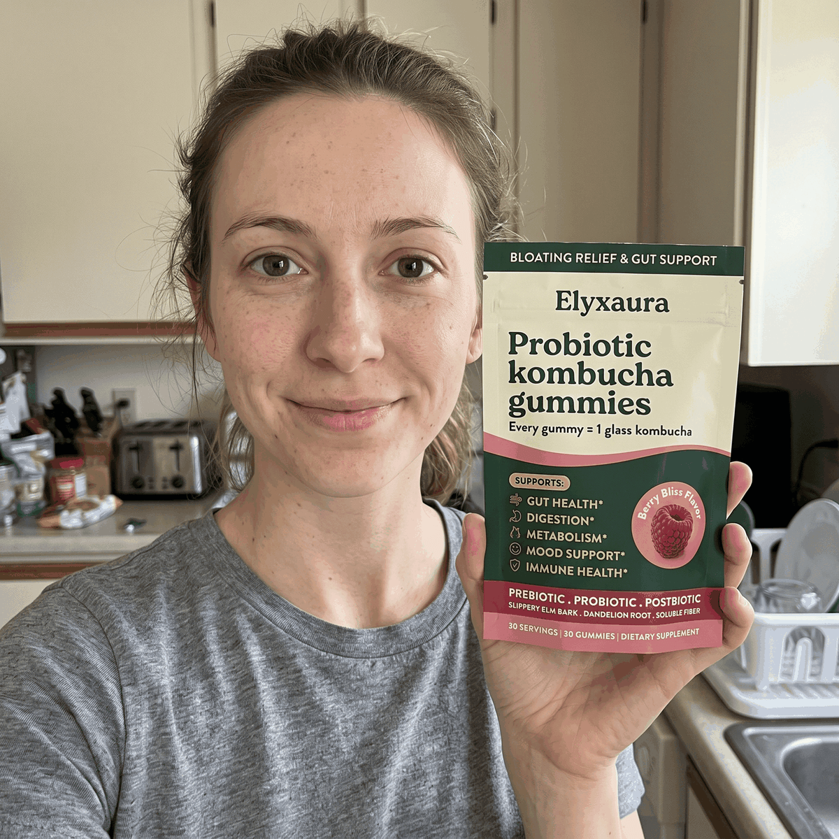 Elyxaura customer holding the pouch